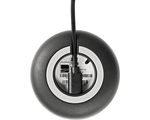 Rückseite eines runden, elektronischen Geräts mit Kabel und Etikett