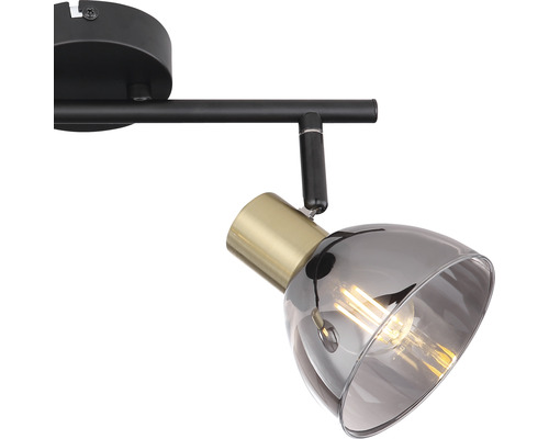 Deckenleuchte mit einem Scheinwerfer und Metallelementen