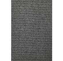 Nahaufnahme eines grauen Teppichs.