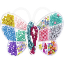Schmetterlingsförmige Sortierbox mit Schmuckperlen und Schmuckbändern