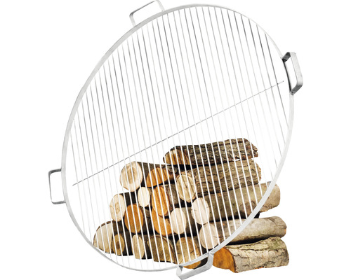 Runder Grillrost mit Holzstapel