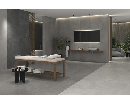 Modernes Badezimmer mit grauen Fliesen, Massageliege und Waschtisch