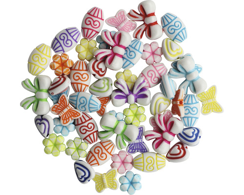 Dekorative Streuteile mit Ostermotiven, wie Eier, Schmetterlinge und Blumen