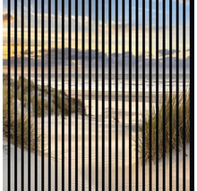 Strandansicht durch Lamellen