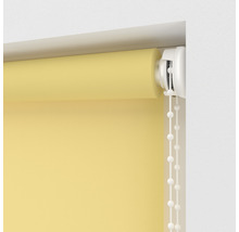 Gelbes Stoffrollo mit Kettenzug zur Fensterdekoration