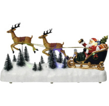 Weihnachtsdekoration mit Weihnachtsmann im Schlitten und Rentieren