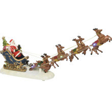 Dekorative Weihnachtsszene mit Santa und Rentierschlitten