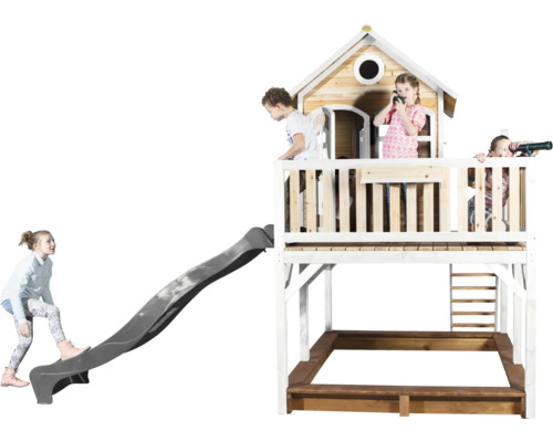 Spielturm mit Rutsche, Sandkasten und spielenden Kindern