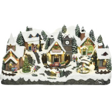 Weihnachtsdorf mit Häusern, Kirche, Bahnhof, Figuren und Zug