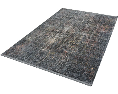 Rechteckiger Teppich mit abstraktem Muster.