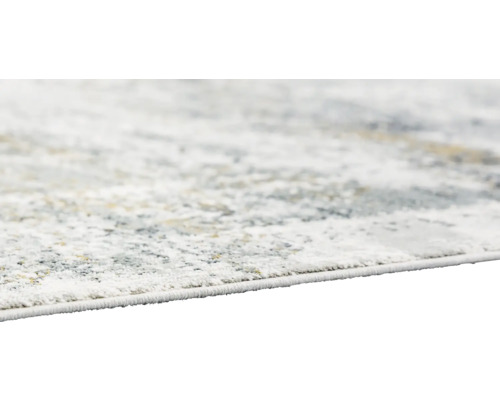 Detailaufnahme eines Teppichs mit abstraktem Muster