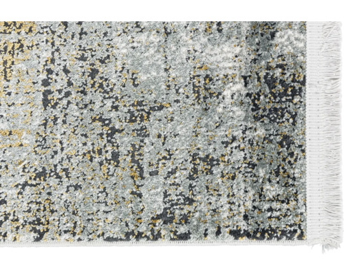 Teppich mit abstraktem Muster und Fransen