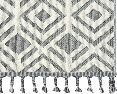 Teppich mit geometrischem Rautenmuster und Fransen