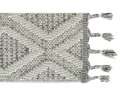 Dekorativer Teppich mit Fransen