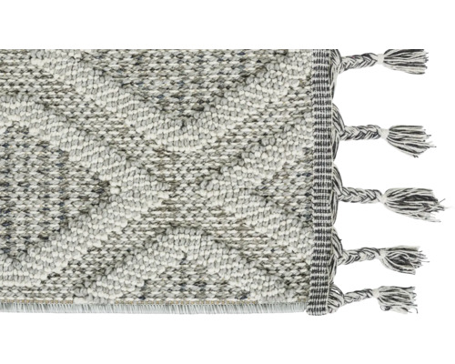 Teppich mit geometrischem Muster und Fransen