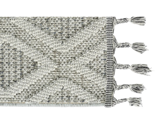 Detailansicht eines Teppichs mit Fransen