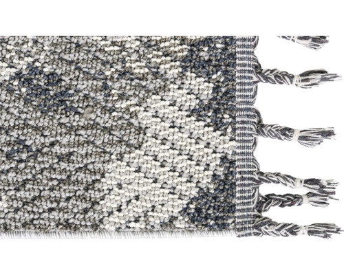 Detailansicht eines Teppichs mit Fransen