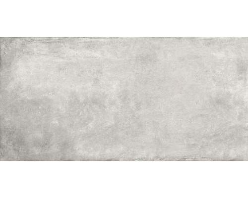 Helle, rechteckige Feinsteinzeugfliese mit Betonoptik.