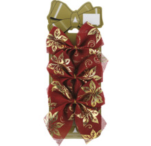 Drei rote Schleifen mit goldenen Blumenmustern zur Dekoration