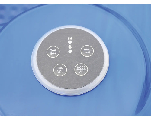 Nahaufnahme eines runden Bedienfelds mit Tasten für FM, Bluetooth, Lautstärke und Modus eines Audiogeräts