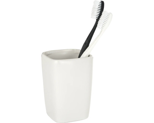 Zwei Zahnbürsten in einem weißen, eckigen Zahnbürstenhalter