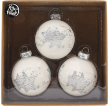 Drei weiße Weihnachtskugeln mit Sternenmuster in Verpackung