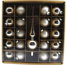 Verpackung mit Christbaumkugeln und Baumspitze