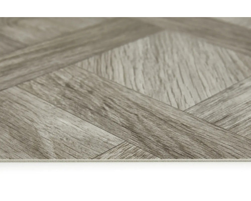 Nahaufnahme eines Vinylbodens in Fischgrätoptik