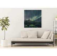 Wandbild mit Berglandschaft über Sofa im Wohnraum
