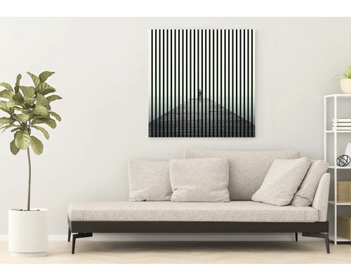 Dekoratives Wandbild mit abstrakter Darstellung im Wohnzimmer.