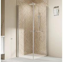 Eckdusche mit Glaswänden und Armaturen im Badezimmer