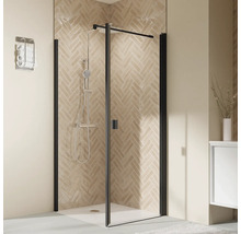 Duschkabine mit schwarzem Rahmen und Duscharmatur in einem Badezimmer