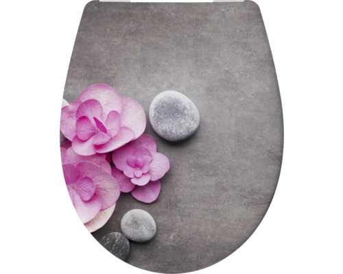 WC-Deckel mit Blumen und Steinen