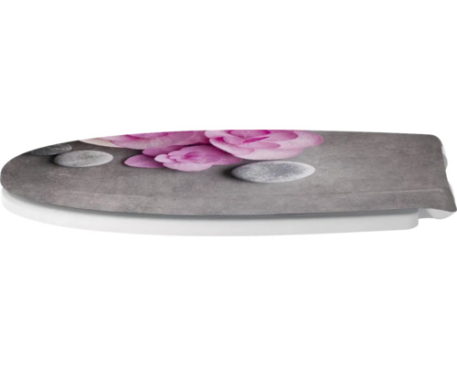Toilettendeckel mit Blumen- und Steinmotiv