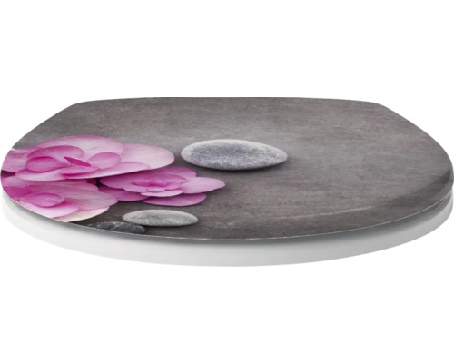 Toilettendeckel mit Blumen- und Steinmotiv