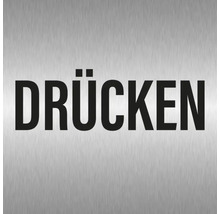Schild mit der Aufschrift Drücken