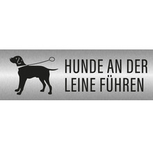 Schild mit der Aufschrift Hunde an der Leine führen