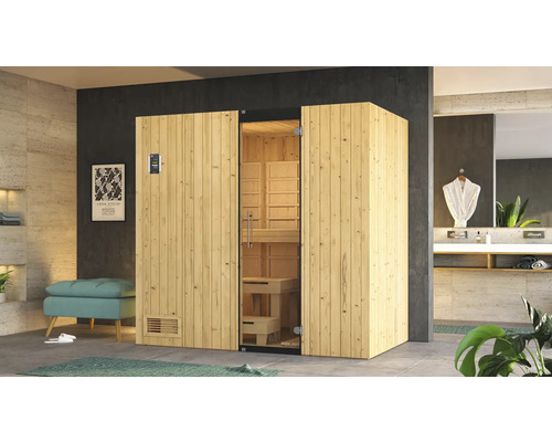 Moderne Sauna aus Holz mit Glastür in einem Badezimmer.