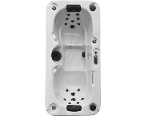 Aufnahme eines Whirlpools von oben, der für Entspannung im Freien konzipiert ist.