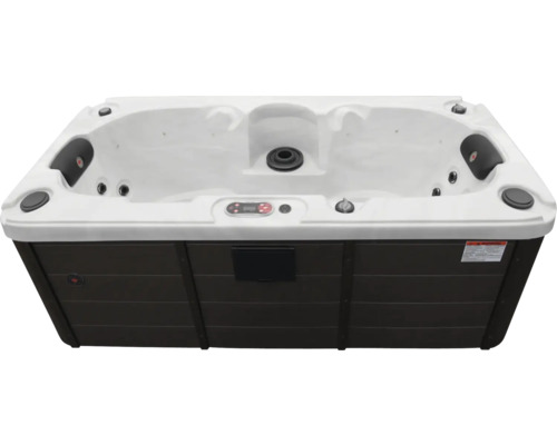 Whirlpool mit brauner Verkleidung und weißem Innenraum