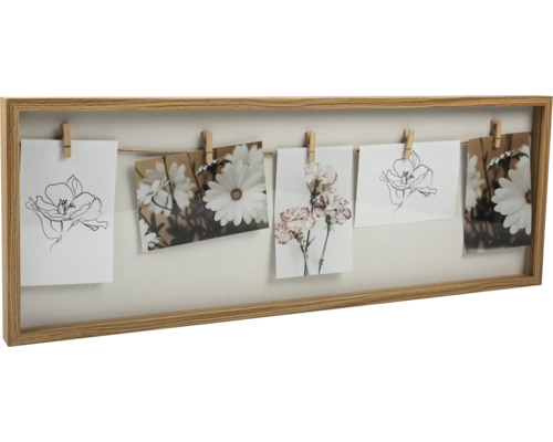 Fotorahmen mit Holzrahmen und Fotos an einer Kordel mit Wäscheklammern befestigt