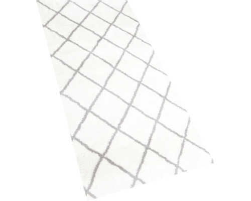 Weißer Teppich mit Rautenmuster