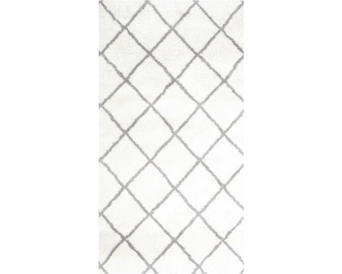 Weißer Teppich mit Rautenmuster