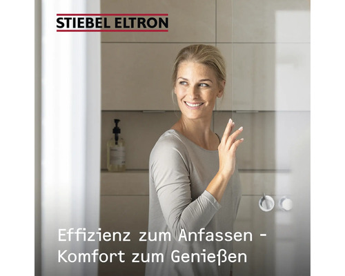 Frau im Badezimmer mit Stiebel Eltron Logo