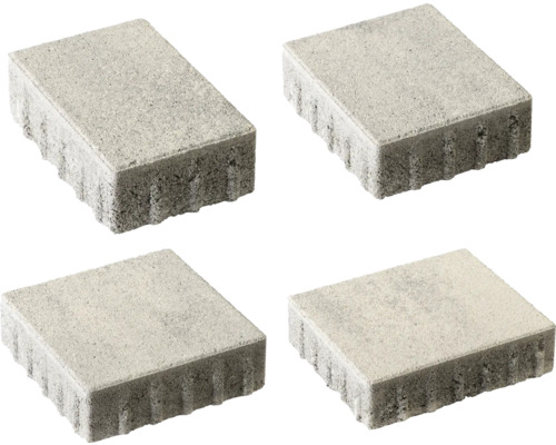 Vier Pflastersteine aus Beton