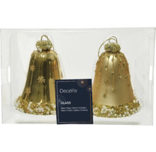 Zwei goldfarbene, gläserne Glockenanhänger für den Weihnachtsbaum in einer Verpackung.