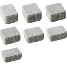 Sieben graue Pflastersteine aus Beton für den Gartenweg