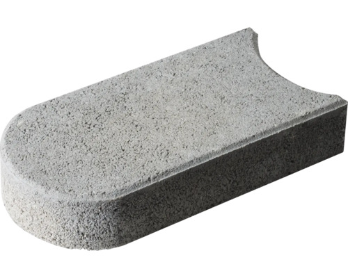 Grauer Beton Pflasterstein mit abgerundeter Ecke