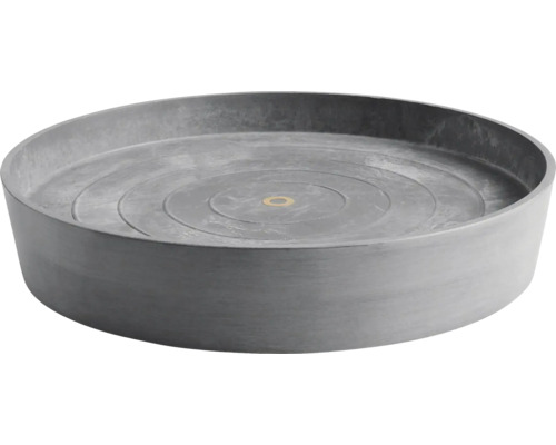 Runder Untersetzer aus Kunststoff mit konzentrischen Rillen