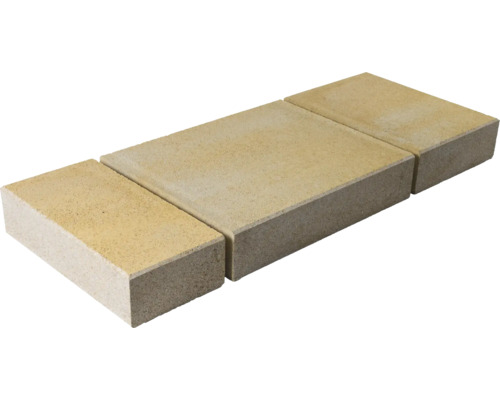 Drei Pflastersteine aus Beton